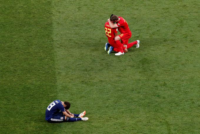 Izjemna radost belgijskih nogometašev in nepopisna žalost Japoncev. | Foto: Reuters