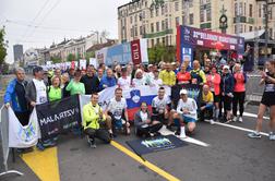 Vedno več slovenskih zastav ob progi tujih maratonov #foto