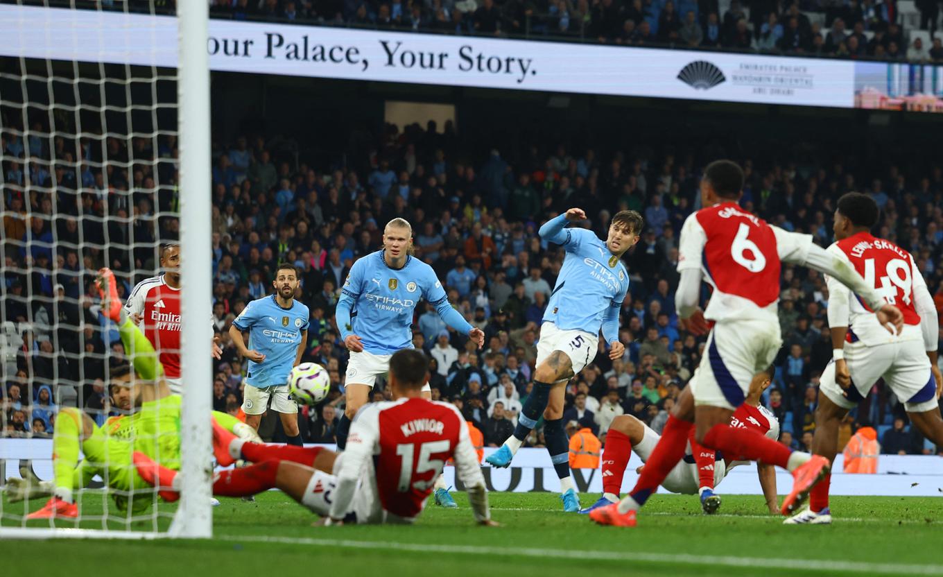   John Stones marcou nos acréscimos para empatar o clássico do City com o Arsenal. | Foto: Reuters