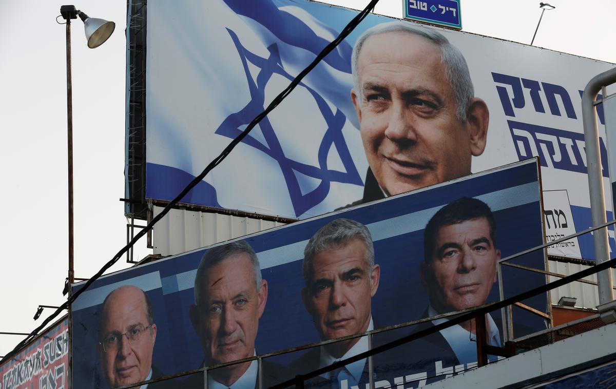 Izrael volitve | Predvolilni plakat stranke Likud, ki jo vodi izraelski premier Benjamin Netanjahu. | Foto Reuters