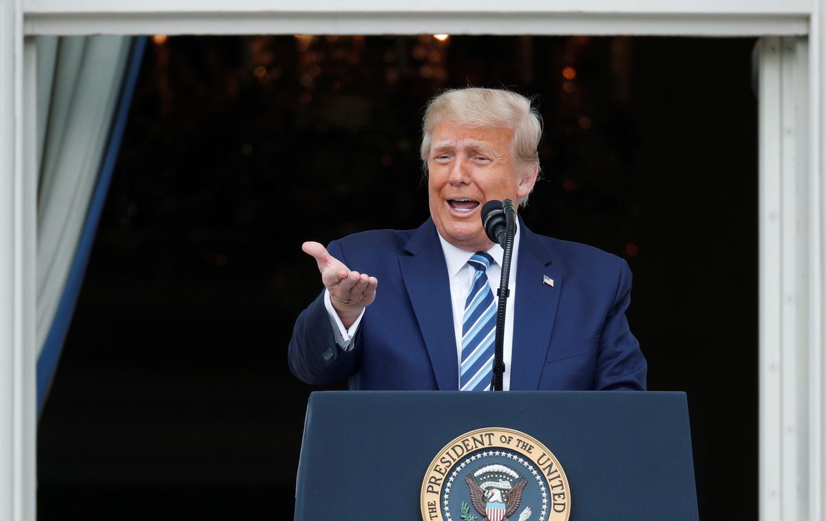 Donald Trump | Znanstveni urad Bele hiše je razglasil zmago nad boleznijo covid-19. | Foto Reuters