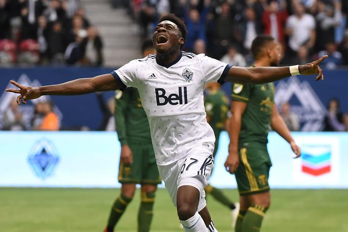 Alphonso Davies je v ligi MLS, kjer bodo v novi sezoni nastopali kar trije Slovenci, blestel v dresu Vancouvra. | Foto: Reuters