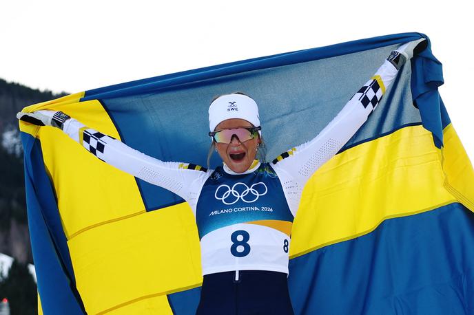 Frida Karlsson |  Frida Karlsson je zmagovalka prve tekaške preizkušnje na olimpijskih igrah Milano Coritna. | Foto Reuters