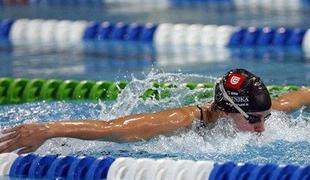 Isakovičeva rekordna na 200 delfin in 100 prosto