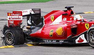 Eksplozija gume v izdihljajih dirke šokirala Ferrari in Vettla