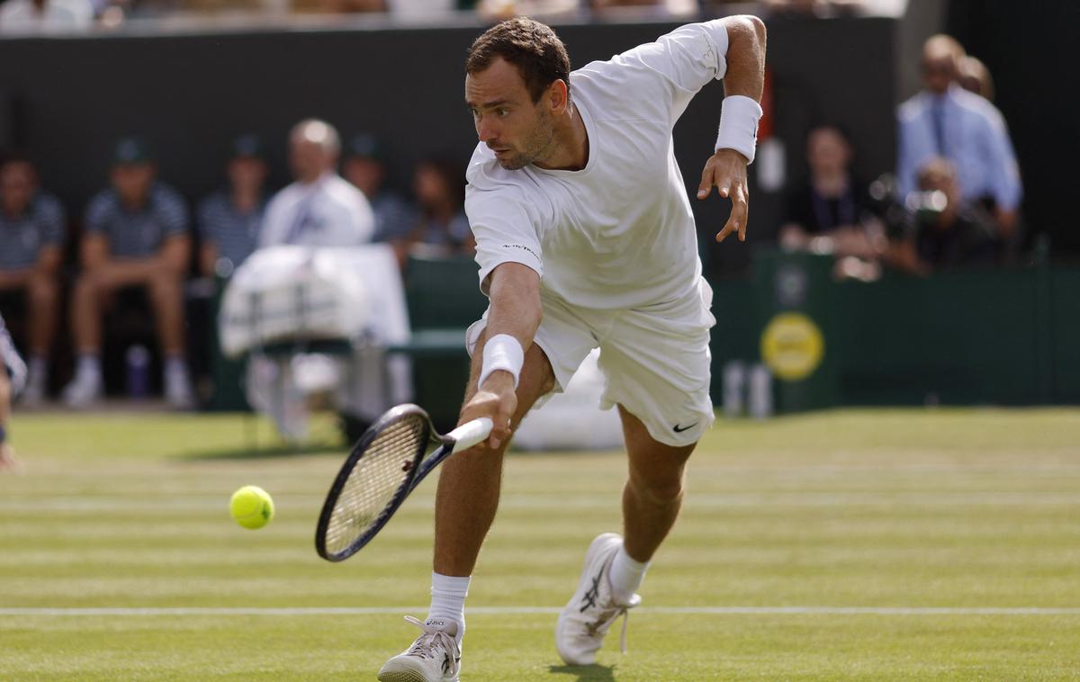 Roman Safjulin | Roman Safjulin je prvi četrtfinalist Wimbledona. | Foto Reuters