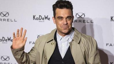 Robbie zanikal govorice o sodelovanju z Adele