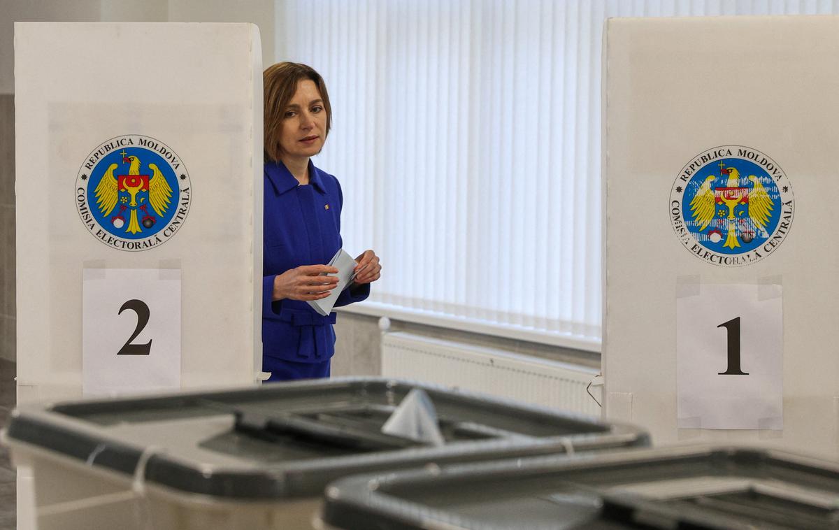 Moldavija, parlamentarne volitve | Odločilni naj bi bili glasovi Moldavcev v tujini, ki navadno glasujejo za PAS, in pa prebivalcev mednarodno nepriznane Pridnestrske republike, ki so večinoma naklonjeni Rusiji. | Foto Reuters