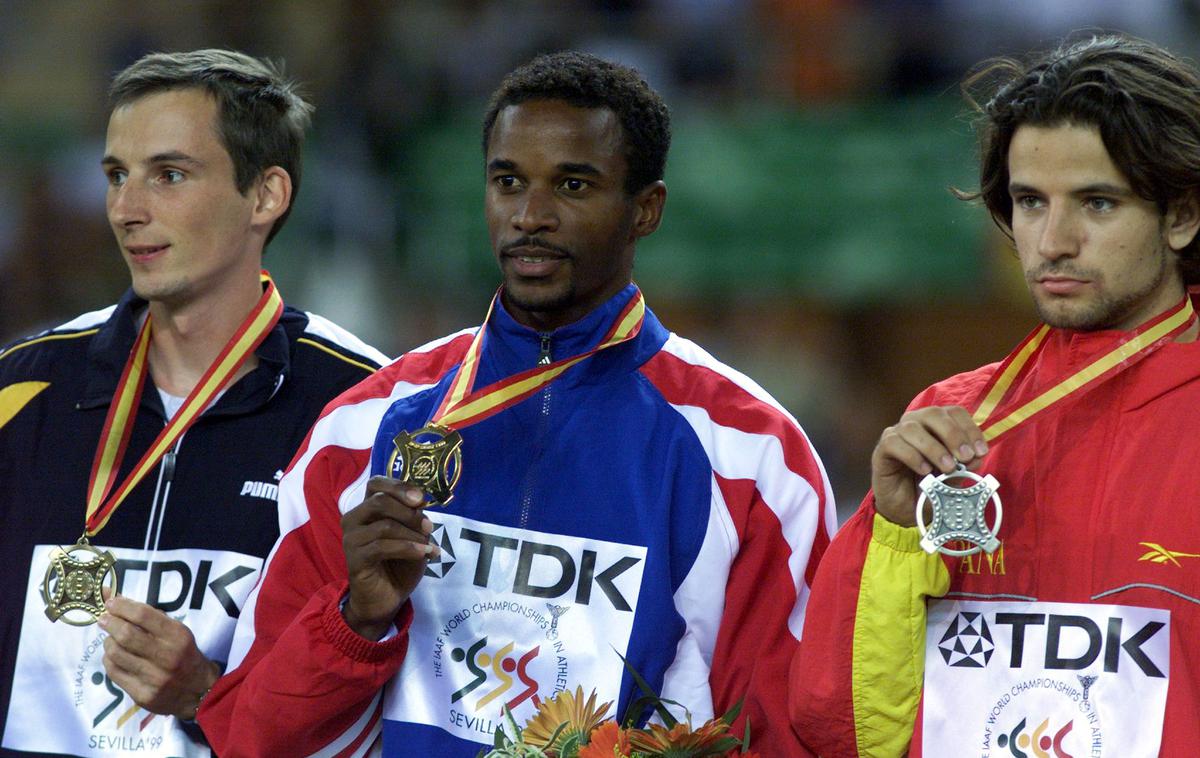 Gregor Cankar SP Sevilla 1999 | Na današnji dan pred 20 leti je Gregor Cankar na svetovnem prvenstvu v Sevilli osvojil bronasto odličje v skoku v daljino. | Foto Reuters