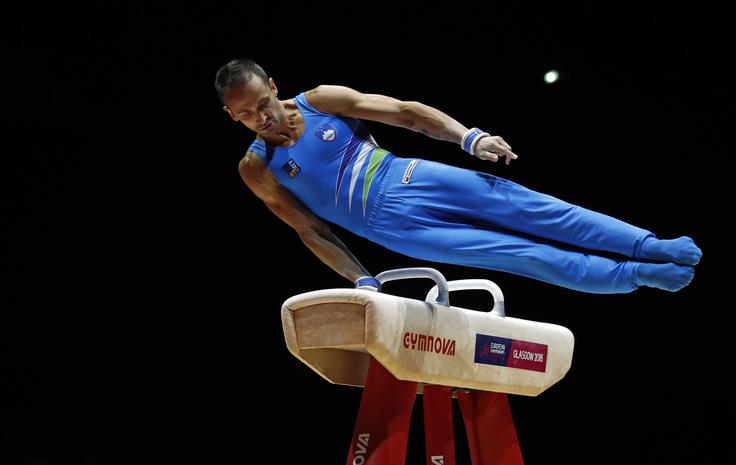 Sašo Bertoncelj je slavil na konju z ročaji. | Foto: Reuters