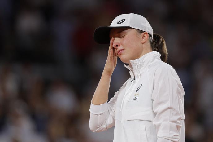 Iga Swiatek finale OP Francije 2022 | Zmagovalka OP Francije se poslavlja z Wimbledona že v 3. krogu. | Foto Reuters