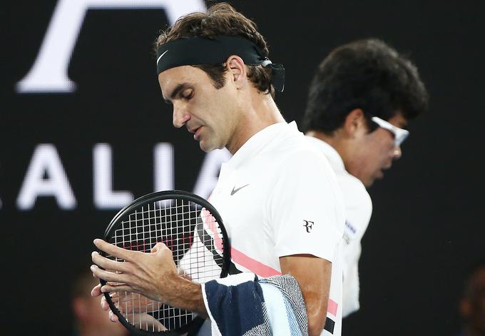 Roger Federer in njegov zaščitni logo RF na oblačilih Nike. Ali bo po novem nastopal v oblačilih Uniqloja? | Foto: Reuters