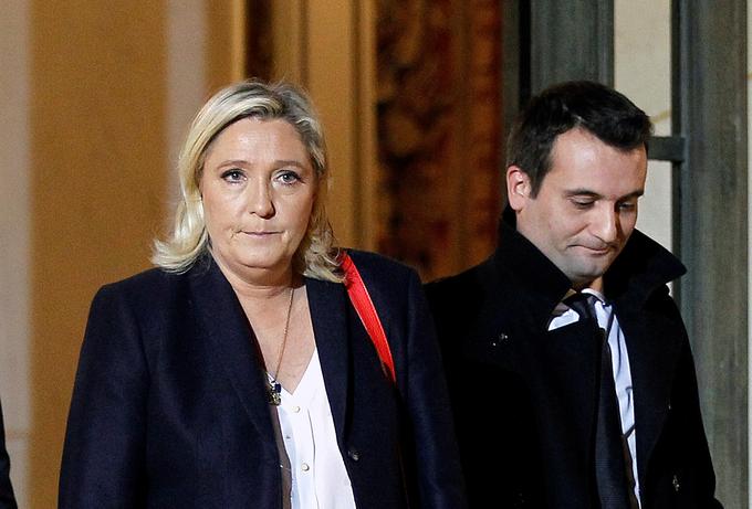 Marine Le Pen ter njen svetovalec in strankin strateg Florian Philippot. Na fotografiji iz novembra 2015, nekaj dni po pariških krvavih pokolih, ki so jih zagrešili islamski skrajneži. | Foto: Getty Images