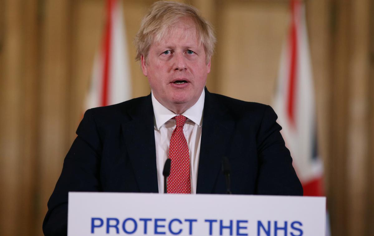 Boris Johnson | "S tem večerom dajem Britancem preprosto navodilo − ostati morate doma," je Johnson dejal pred letom dni, ko je naznanil najostrejše omejitve javnega življenja v državi po koncu druge svetovne vojne. | Foto Reuters