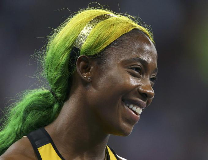 Shelly-Ann Fraser-Pryce je jamajška tekačica na sto metrov. Lasje so ji sijali v nacionalnih barvah. | Foto: Reuters