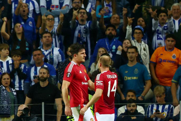 Harry Maguire | Harry Maguire je v sodnikovem podaljšku popeljal Manchester United do točke na Portugalskem (3:3). | Foto Reuters