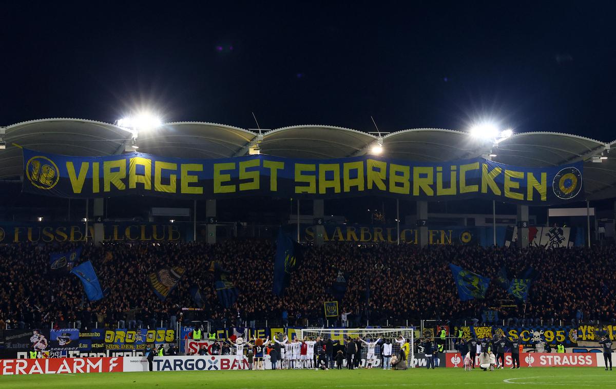 Saarbrücken | Veselje nogometašev Saarbrückna po zmagi nad Eintrachtom iz Frankfurta. | Foto Reuters