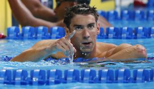 Phelps bo vihtel ameriško zastavo na odprtju OI