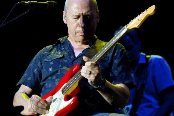 Knopfler bo tudi s pesmimi Dire Straits zavzel Stožice