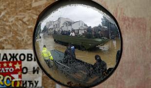 Število žrtev narašča, poplavne razmere se na srečo umirjajo (foto in video)