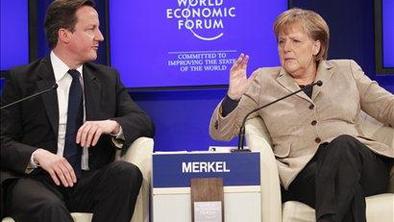 Cameron v Davosu branil varčevalne ukrepe, Geithner opozarjal na previdnost
