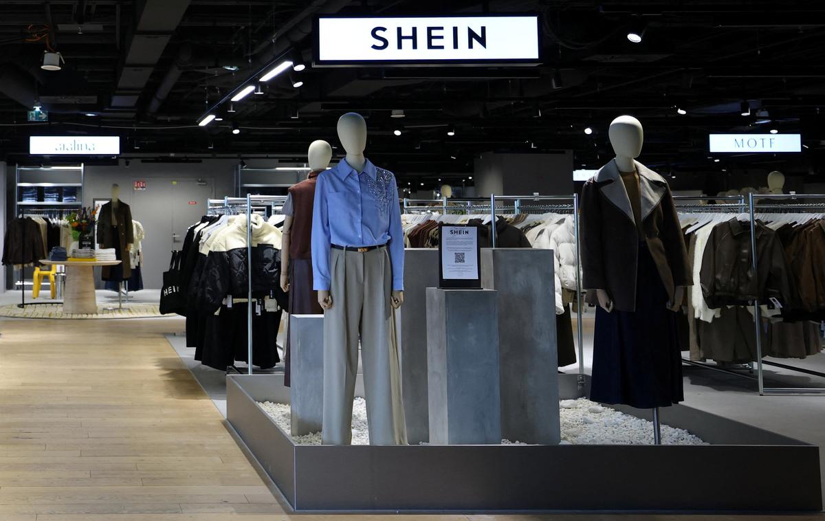 Shein, trgovina | Shein, ki je bil ustanovljen na Kitajskem leta 2012, zdaj pa ima sedež v Singapurju, se sooča s kritikami zaradi delovnih pogojev v njegovih tovarnah in vpliva na okolje njegovega poslovnega modela ultra hitre mode. | Foto Reuters