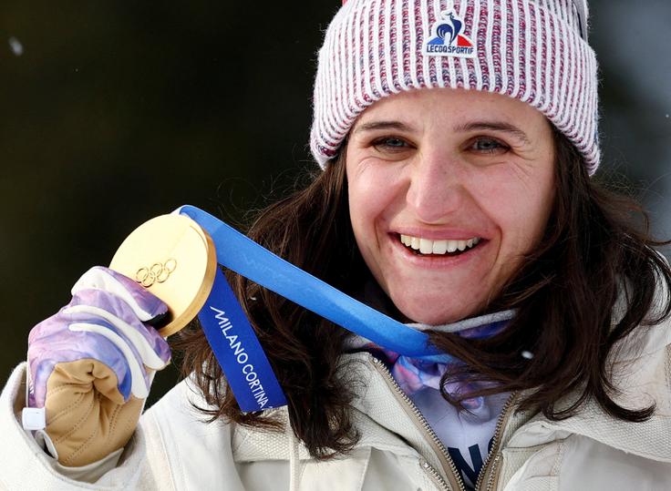 Julia Simon, ki je ogromno prahu dvignila z afero bančna kartica, je osvojila tri zlate in srebrno odličje. | Foto: Reuters
