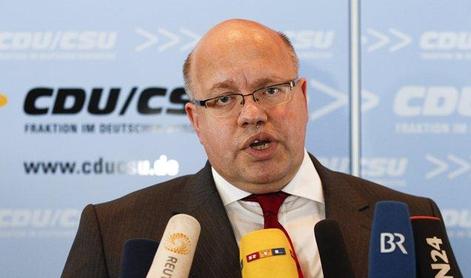 Merklova po volilnem porazu odstavila okoljskega ministra