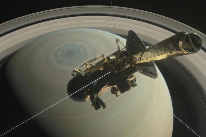 Cassini na zadnji poti proti Saturnu, uprizoritev umetnika vesoljske agencije Nasa | Foto: Reuters