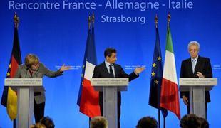 Merklova in Sarkozy: Padec Italije bi pomenil dokončen konec evra