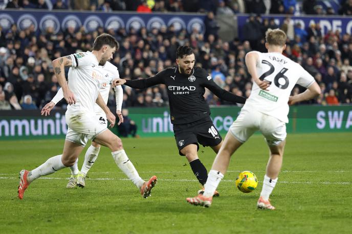 Swansea - Manchester City | Manchester City je izločil Swansea Žana Vipotnika. | Foto Reuters