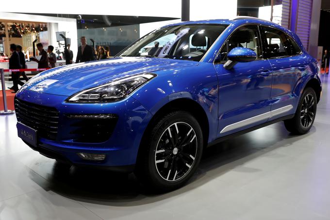 Zotye Auto ima športni terenec SR9, ki močno spominja na porscheja macana in velja za eno najbolj znanih kitajskih avtomobilskih kopij. | Foto: Reuters