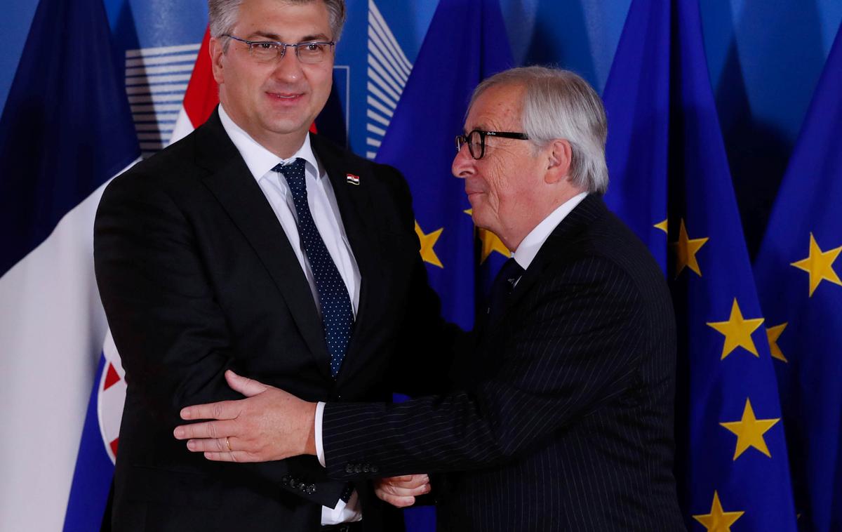 Andrej Plenković in Jean-Claude Juncker | V Zagrebu so prepričani, da bo Slovenija blokirala vstop Hrvaške v schengen. Na fotografiji hrvaški premier Andrej Plenković in odhajajoči predsednik Evropske komisije Jean-Claude Juncker. | Foto Reuters