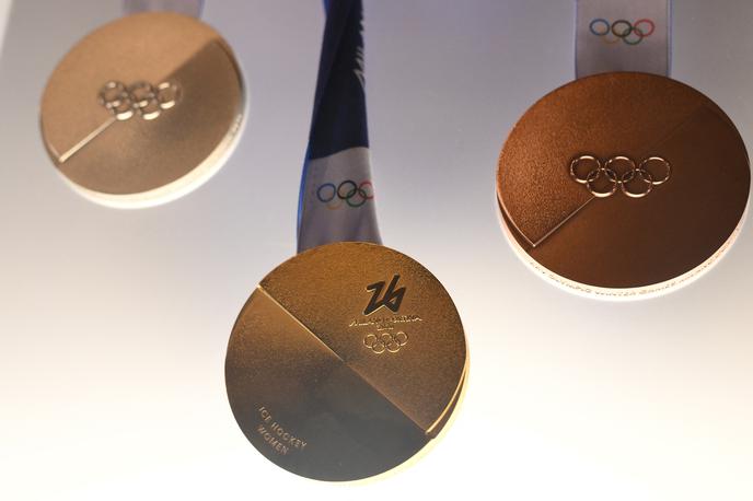 olimpijske kolajne 2026 Cortina Milano | To so kolajne, za katere se bodo športniki borili februarja 2026. | Foto Reuters
