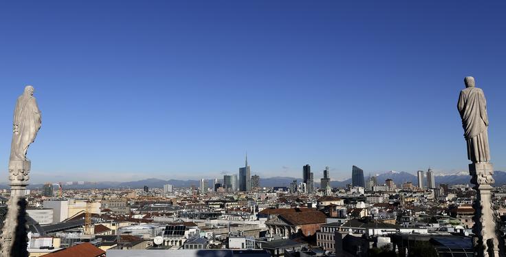 Sever Italije velja za gospodarsko središče države. Zaradi industrije, ki je zgoščena na tem področju, je zrak precej onesnažen. | Foto: Reuters
