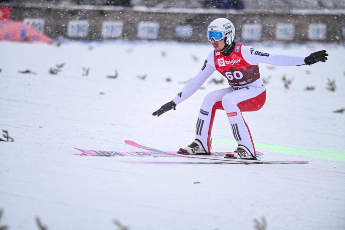 Johan Andre Forfang | Johann Andre Forfang je po kaotični poti iz Trondheima v Planico kljub neprespani noči navdušil v kvalifikacijah. | Foto Guliverimage