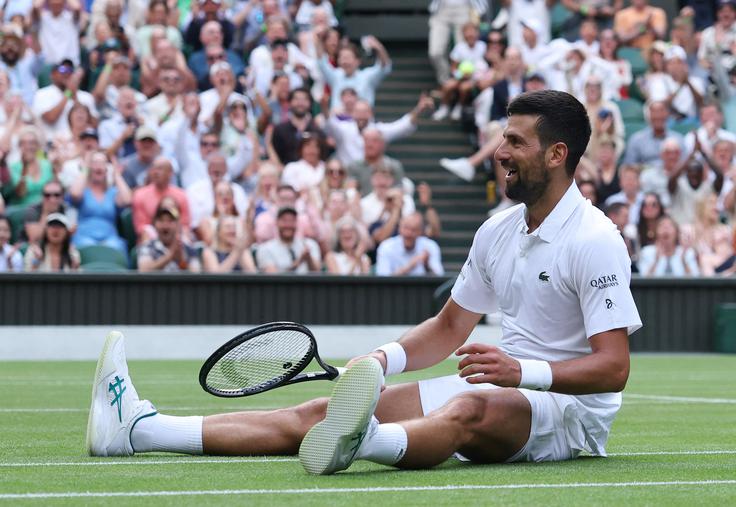 Novak Đoković je dosegel stoto zmago v Wimbledonu. | Foto: Reuters