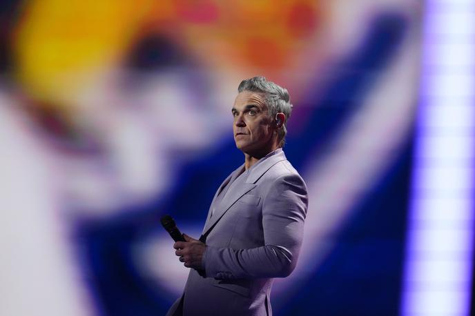 Robbie Williams | "To je neverjetno. Absolutno neverjetno," je pevec povedal v odzivu za BBC News in dodal, da je njegov uspeh enak raztegovanju elastike od njegovega rodnega mesta Stoke-on-Trent do Lune. | Foto Guliverimage