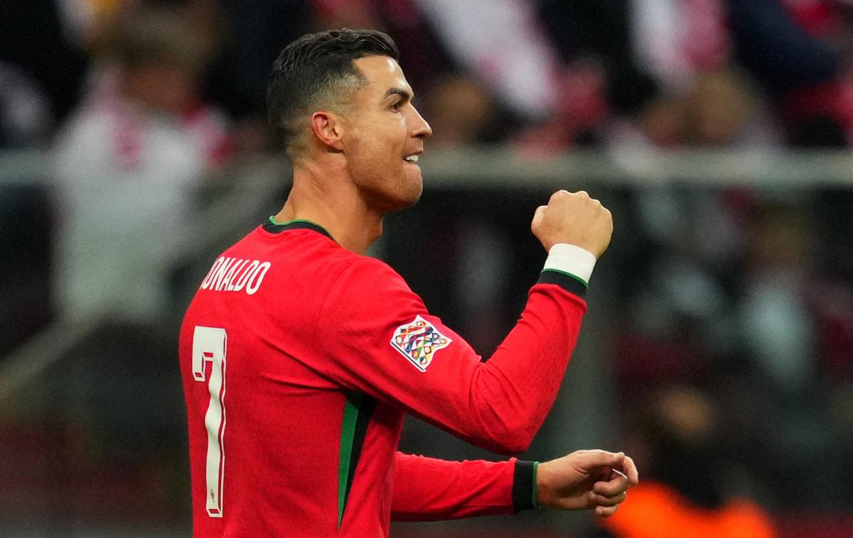 Cristiano Ronaldo | Cristiano Ronaldo je v karieri v klubskem in reprezentančnem dresu na uradnih tekmah dosegel že 906 zadetkov. Pod zadnjega se je podpisal v soboto v Varšavi. | Foto Reuters