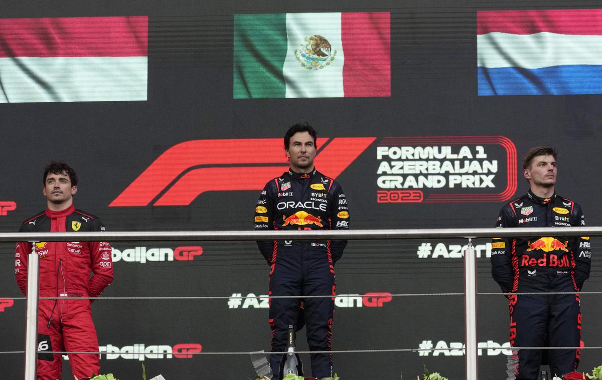 Baku Sergio Perez Red Bull | Zmagal je Perez. Leclerc se je postavil na drugo stopničko, a je bil tretji. So pa hitro zamenjali zastavi. | Foto Reuters