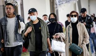 Slovenec na Kitajskem: Posebne enote ljudem merijo vročino #video
