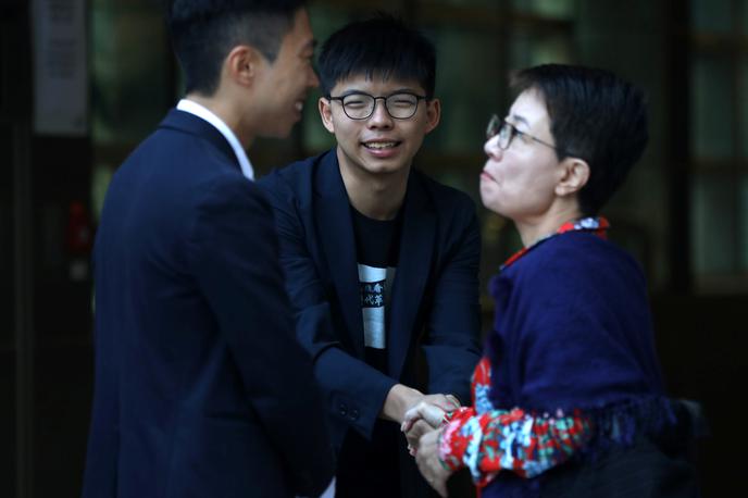 Kelvin Lam in Joshua Wong | Foto Reuters