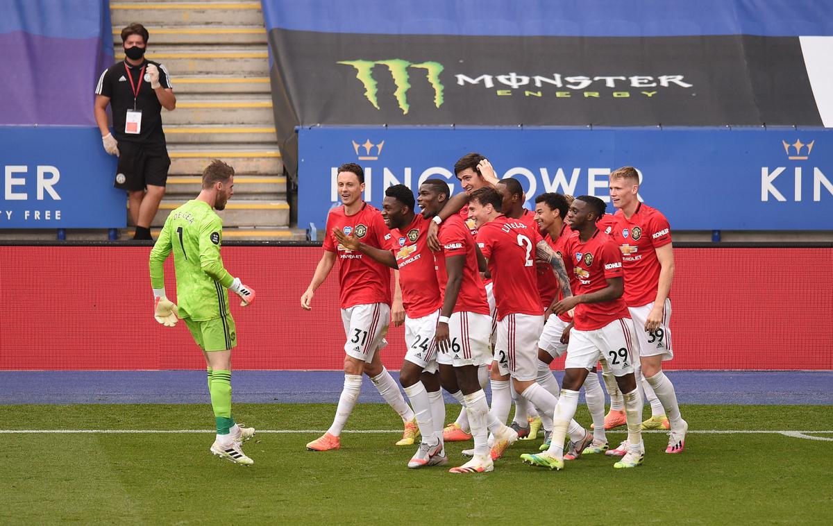 Manchester United | Veselje nogometašev Manchester Uniteda, ki so si z zmago v zadnjem krogu zagotovili ligo prvakov. | Foto Reuters