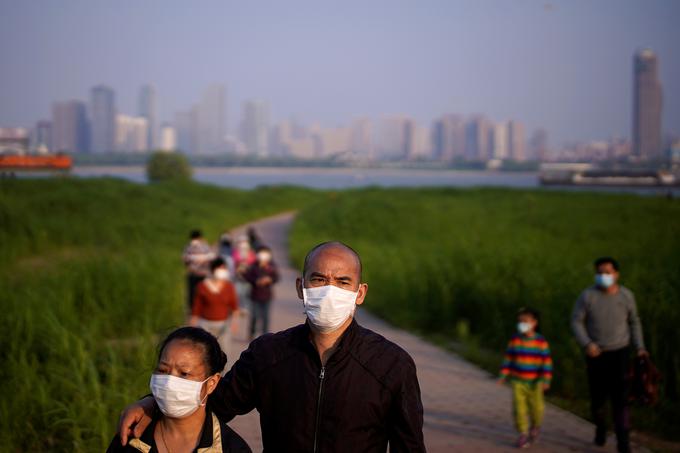 Wuhan je mesto, kjer je lani decembra ali novembra izbruhnila pandemija novega koronavirusa. Mesto, ki mu pravijo tudi kitajski Chicago, je bilo v tako imenovanem lockdownu, to je v stanju skoraj popolnega zaprtja javnega in gospodarskega življenja, od 23. januarja do 8. aprila.  | Foto: Reuters