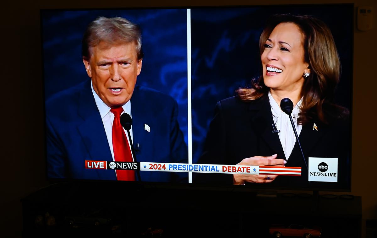 Donald Trump. Kamala Harris. | Ankete v ključnih državah, ki bodo odločale o zmagovalcu volitev, so še naprej izjemno tesne.  | Foto Reuters