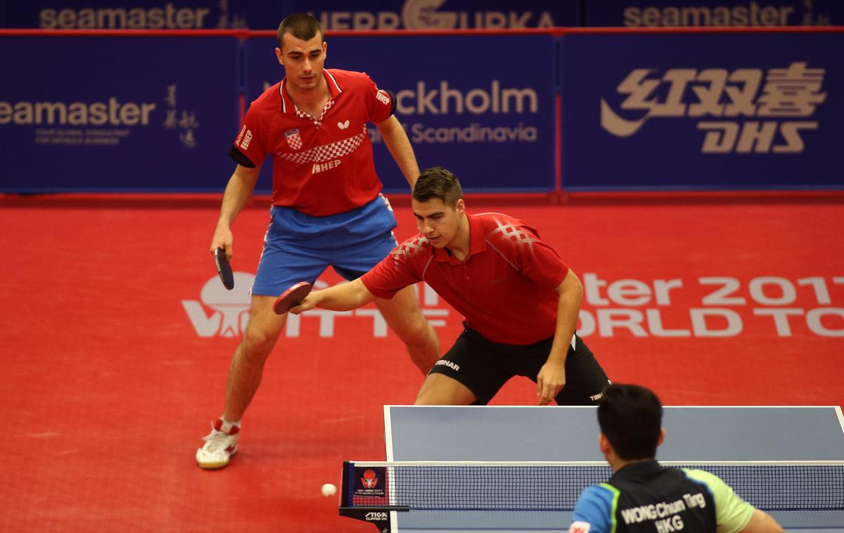 Darko Jorgić Tomislav Pucar | Najboljši slovenski namiznoteniški igralec Darko Jorgić in Hrvat Tomislav Pucar sta končala nastope na svetovnem prvenstvu v Dohi v konkurenci dvojic.  | Foto worldtabletennis.com