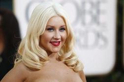 Aguilera: Razlog za ločitev je bila nezvestoba