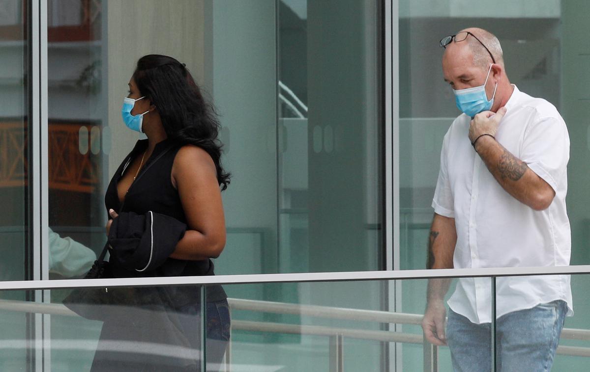 Par iz Singapurja | 52-letnik je večkrat kršil karanteno, da se je sestal s svojo 39-letno zaročenko. | Foto Reuters