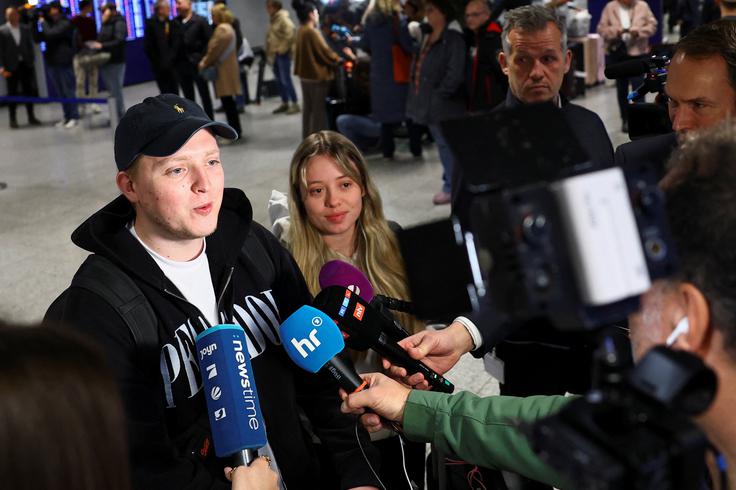 Nemški potniki, evakuirani iz Dubaja.  | Foto: Reuters