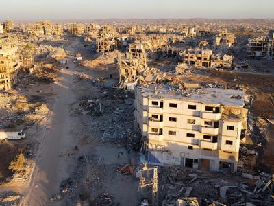 V izraelskih napadih v Gazi ubitih 13 ljudi